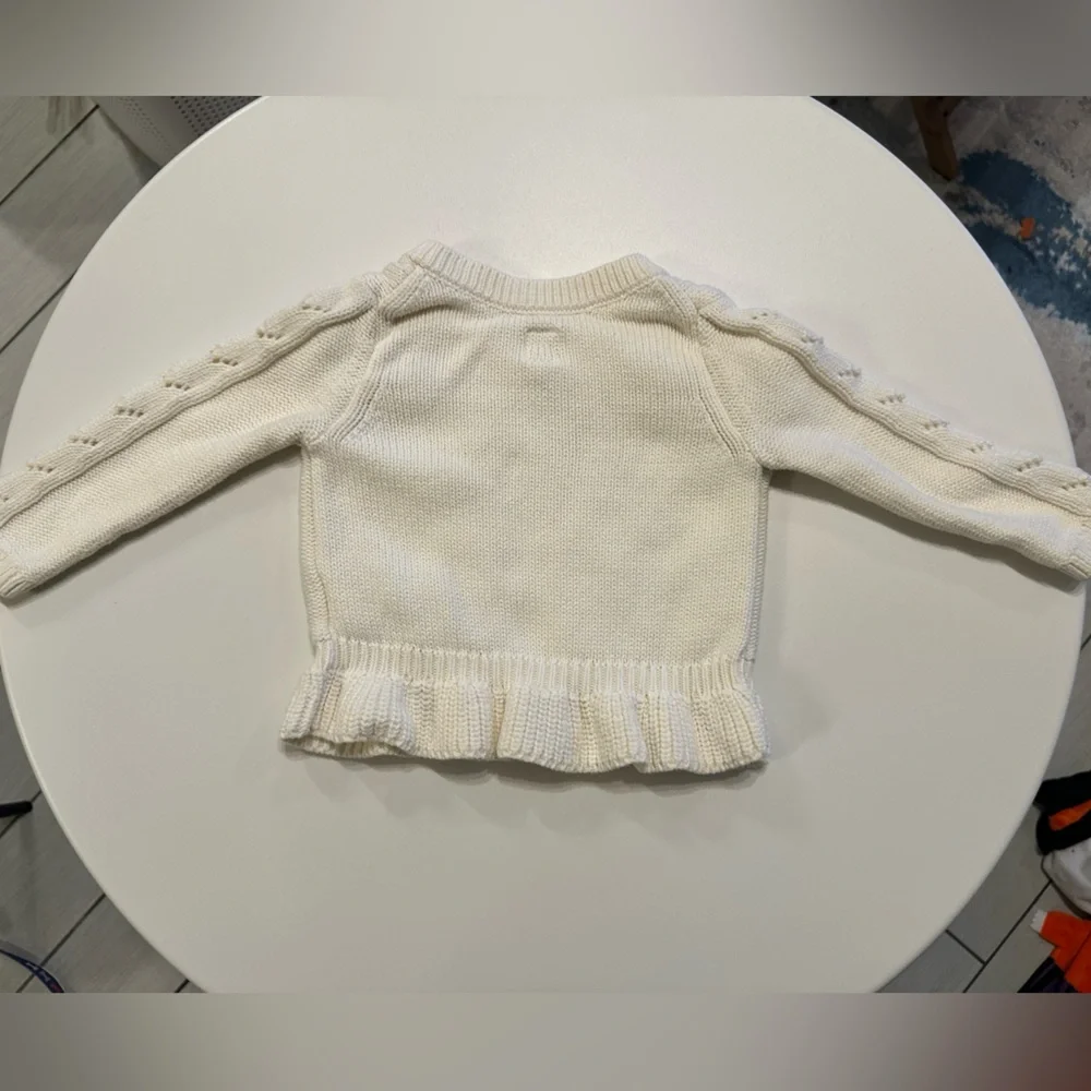 Baby Gap cable knit peplum sweater
